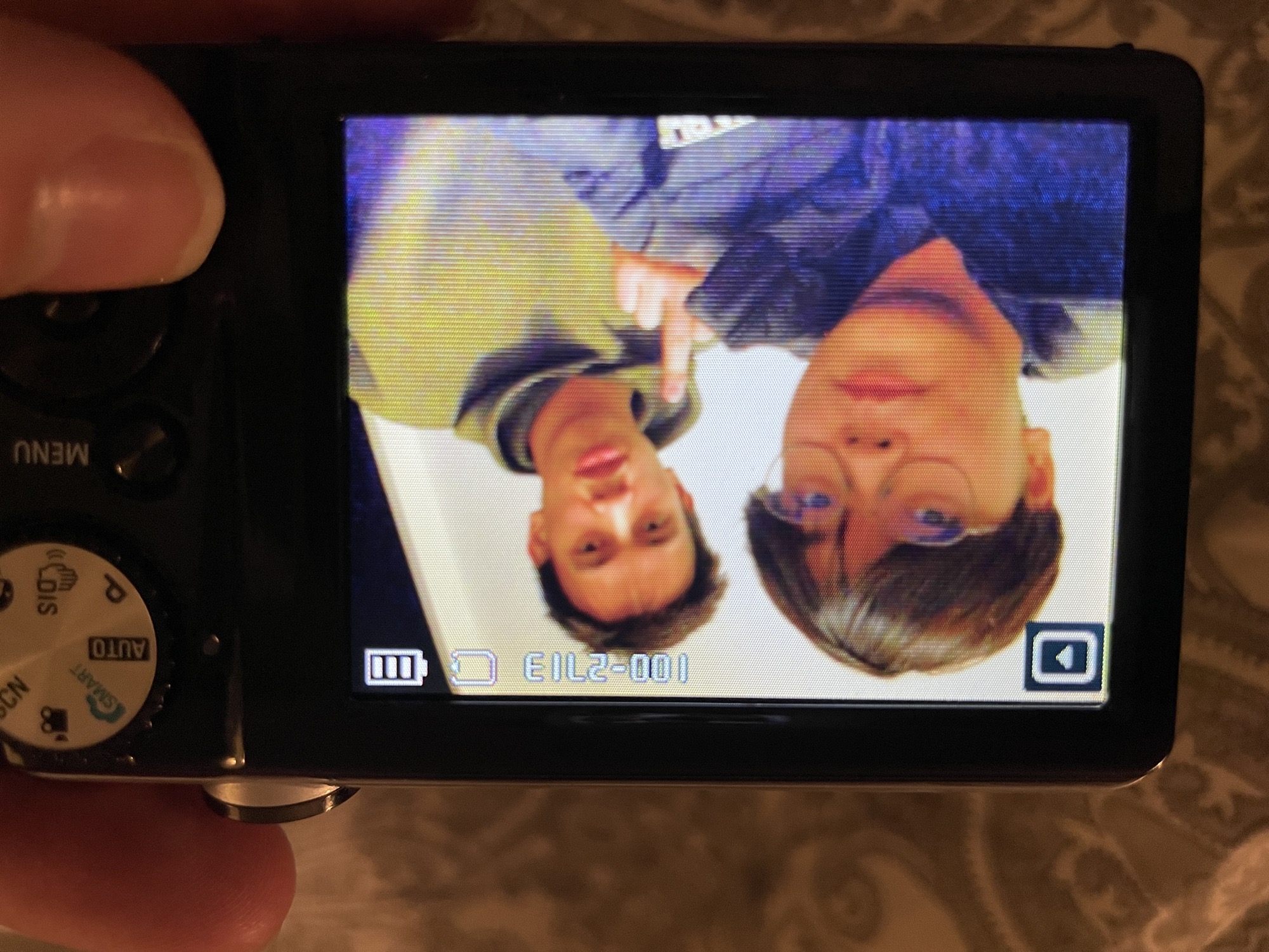 A birthday memory of Zayn and a friend on a camera screen